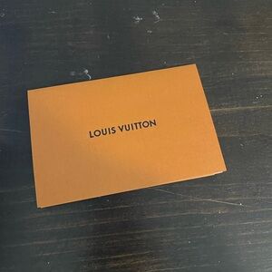 Louis Vuitton receipt holder